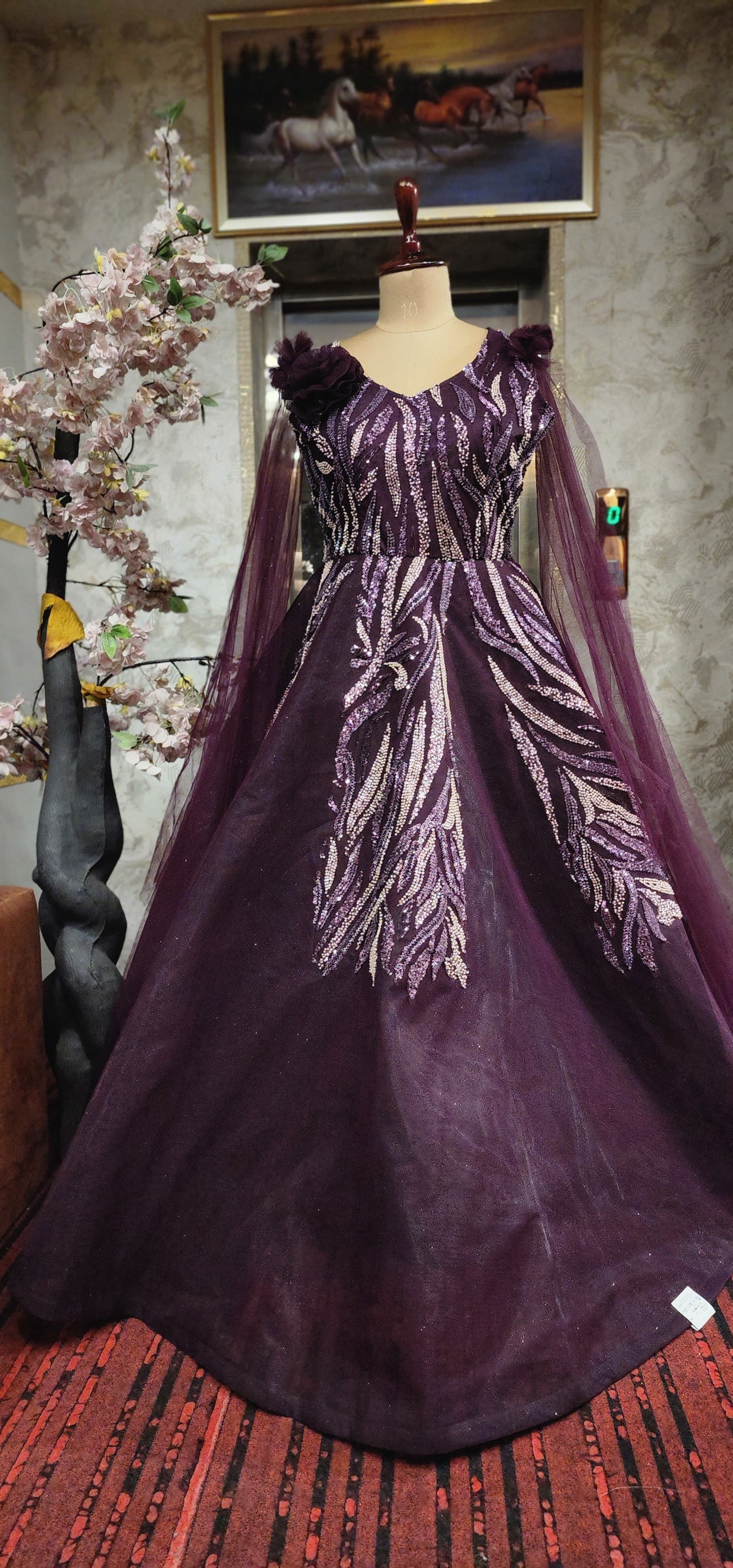 Gown (G01L7)